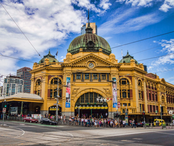 Flinders Street Station in Melbourne. Designed by James Fawcett and H. P. C. Ashworth in 1899, over 110,000 commuters and 1,500 trains pass through the station every weekday.